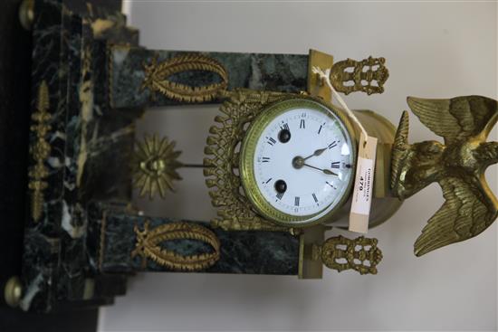 A French Empire style ormolu mounted green marble portico clock, 15.5in.